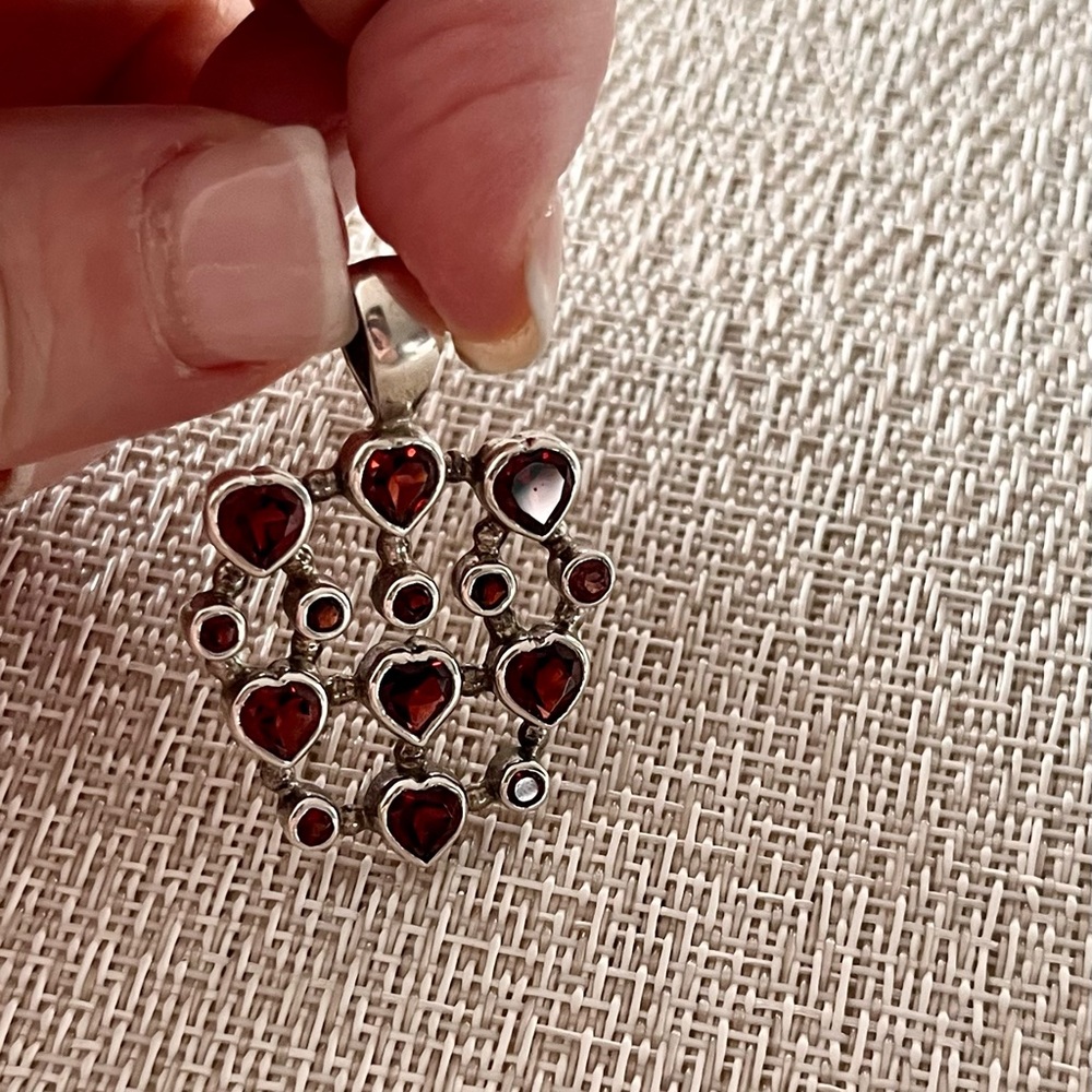 Unique Sterling Silver garnet multi-Heart Pendant.